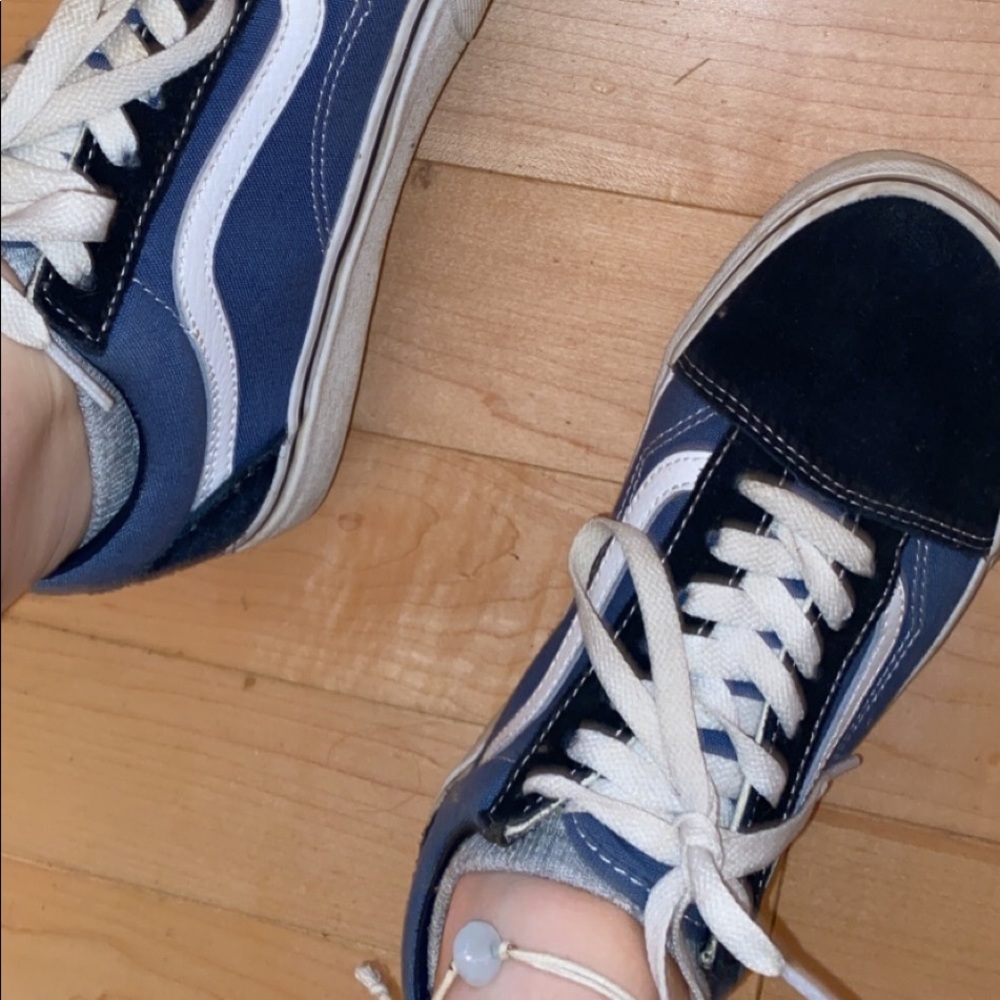 Blue and black old skool vans